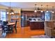 Kitchen featuring dark wood cabinets, stainless steel appliances, and a center island at 219 Eagles Landing Way, Mcdonough, GA 30253