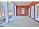 Spacious covered porch with sturdy support columns provides a cool and shady escape at 219 Eagles Landing Way, Mcdonough, GA 30253