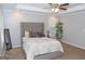 Bedroom with trey ceilings, ceiling fan, upholstered bed frame, and soft carpet at 1103 Coleman Sw St, Atlanta, GA 30310