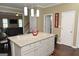 Kitchen island overlooking dining area with a view to the staircase at 1103 Coleman Sw St, Atlanta, GA 30310