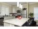 Kitchen island featuring granite countertops, stainless steel appliances, and pendant lighting at 1103 Coleman Sw St, Atlanta, GA 30310