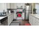 Kitchen featuring stainless steel appliances, granite countertops, and tiled backsplash at 1103 Coleman Sw St, Atlanta, GA 30310