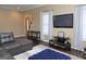 Living room with an open layout, a TV and hardwood floors at 1103 Coleman Sw St, Atlanta, GA 30310