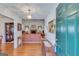 View of the foyer with hardwood floors, and a view into the living room at 4623 Mulberry Fields, Auburn, GA 30011