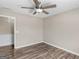 Bedroom with a ceiling fan and wood-look flooring at 195 Brighton Dr, Covington, GA 30016