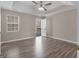 Bedroom featuring an exit to the deck, ceiling fan and natural light at 195 Brighton Dr, Covington, GA 30016