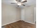 Bedroom featuring neutral walls, hardwood floors, and a ceiling fan at 195 Brighton Dr, Covington, GA 30016