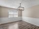 Well-lit dining room with a modern chandelier and a serene space for gatherings and meals at 195 Brighton Dr, Covington, GA 30016