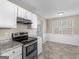 View of the modern kitchen featuring stainless steel appliances at 195 Brighton Dr, Covington, GA 30016