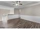 Spacious living area with wood-look floors, neutral paint and white trim at 195 Brighton Dr, Covington, GA 30016