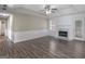 Living room featuring a marble fireplace and an open floor plan with wood floors at 195 Brighton Dr, Covington, GA 30016