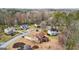 Bird's eye view features neat houses with big yards, tall trees, and quiet, winding roads at 10175 Point View Dr, Jonesboro, GA 30238