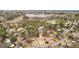 Aerial view of a two-story home with a manicured lawn and a winding driveway at 10175 Point View Dr, Jonesboro, GA 30238