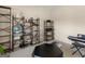 A cozy sitting area with shelving, books, decor, and a modern geometric coffee table at 508 Fall Creek Ct, Mcdonough, GA 30253