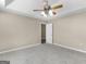 Bedroom featuring trey ceilings, a ceiling fan, carpet flooring, and neutral walls at 231 Ashley Trace Dr, Locust Grove, GA 30248