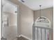 Entryway featuring staircase, chandelier, and doorway to bedroom and living room at 231 Ashley Trace Dr, Locust Grove, GA 30248