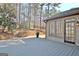An inviting backyard featuring a wooden deck, access to nature, and serene views at 245 Highview Trce, Fayetteville, GA 30215