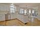 Well-lit kitchen with stainless steel appliances, gas stovetop, and convenient island seating at 245 Highview Trce, Fayetteville, GA 30215