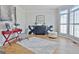 Well-lit living room with hardwood floors, neutral decor, and elegant furnishings at 245 Highview Trce, Fayetteville, GA 30215