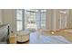 Bright living area featuring hardwood floors, large windows with shutters, and neutral decor at 245 Highview Trce, Fayetteville, GA 30215