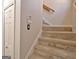 Carpeted staircase leading to the upper level of the home at 245 Highview Trce, Fayetteville, GA 30215