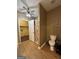 Bathroom featuring built-in storage, and a connecting laundry room at 3 Elm St, Porterdale, GA 30014