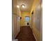 Hallway featuring built in storage and laundry area at 3 Elm St, Porterdale, GA 30014