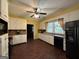 Traditional kitchen features ample counter space, white cabinetry, and modern black appliances at 3 Elm St, Porterdale, GA 30014