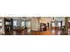 Open floor plan featuring hardwood floors, fireplaces, built in shelving and ceiling fans at 3 Elm St, Porterdale, GA 30014