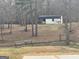 Backyard view featuring an outbuilding and a swing set at 1029 Hines Rd, Moreland, GA 30259