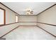 Spacious bedroom with neutral walls, trim, and large window to enjoy the backyard view at 105 Jasper Dr, Stockbridge, GA 30281