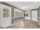 Charming dining area featuring built-in shelving, a bay window, and access to a screened-in porch at 105 Jasper Dr, Stockbridge, GA 30281