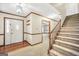 Traditional foyer featuring a staircase, hardwood floors and trim at 105 Jasper Dr, Stockbridge, GA 30281