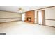 Large living room with a fireplace, abundant space, and natural light for comfortable living and entertaining at 105 Jasper Dr, Stockbridge, GA 30281