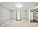 Cozy living room with neutral paint and trim work, ready for your personal touches at 105 Jasper Dr, Stockbridge, GA 30281