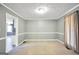Spacious living room with ample natural light, providing an open space for relaxation and entertainment at 105 Jasper Dr, Stockbridge, GA 30281