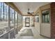 The screened in porch is a great place to relax, with a fan and lots of windows at 105 Jasper Dr, Stockbridge, GA 30281