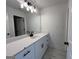 Modern bathroom features a sleek vanity with black fixtures and a spacious mirror at 349 Lowbrooke Ct # 19, Fairburn, GA 30213