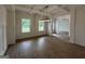 Bright dining room with wood floors, stylish lighting, and a view of the outdoors at 349 Lowbrooke Ct # 19, Fairburn, GA 30213