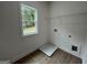 Laundry room with washer and dryer hookups and shelving at 349 Lowbrooke Ct # 19, Fairburn, GA 30213
