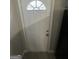A white entry door with a decorative window at 1457 Richland Sw Rd, Atlanta, GA 30310