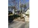 Charming single-Gathering home featuring a cozy front porch and well-maintained landscaping at 1457 Richland Sw Rd, Atlanta, GA 30310