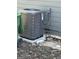 Exterior home features air conditioning unit and trash cans at 1457 Richland Sw Rd, Atlanta, GA 30310