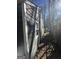 Side of home with gray siding and white trim at 1457 Richland Sw Rd, Atlanta, GA 30310
