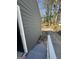 Home exterior shows gray siding and white trim with stairs leading to an entrance at 1457 Richland Sw Rd, Atlanta, GA 30310