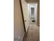 Bright hallway with wood-style flooring leads to a bedroom at 1457 Richland Sw Rd, Atlanta, GA 30310