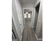 Hallway view into the living room with a chandelier at 1457 Richland Sw Rd, Atlanta, GA 30310