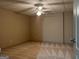 Finished basement with ceiling fan and carpet at 232 Darwish Dr, Mcdonough, GA 30252