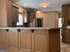 Kitchen bar with a counter and plenty of cabinets at 232 Darwish Dr, Mcdonough, GA 30252