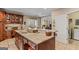 Spacious kitchen with granite countertops, custom cabinetry, and stainless steel sink at 417 Harper Rd, Mcdonough, GA 30252